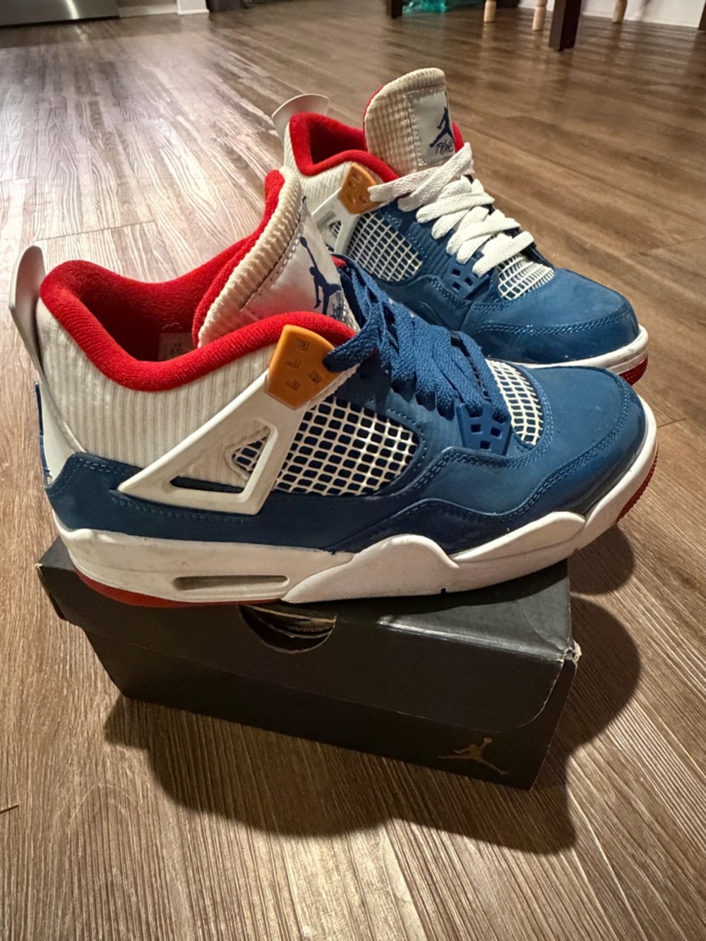 Air Jordan 4 Retro ‘Messy Room Jordan Blue, White & Red Sneakers